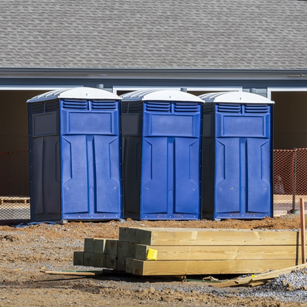 what is the cost difference between standard and deluxe porta potty rentals in Flowing Wells Arizona